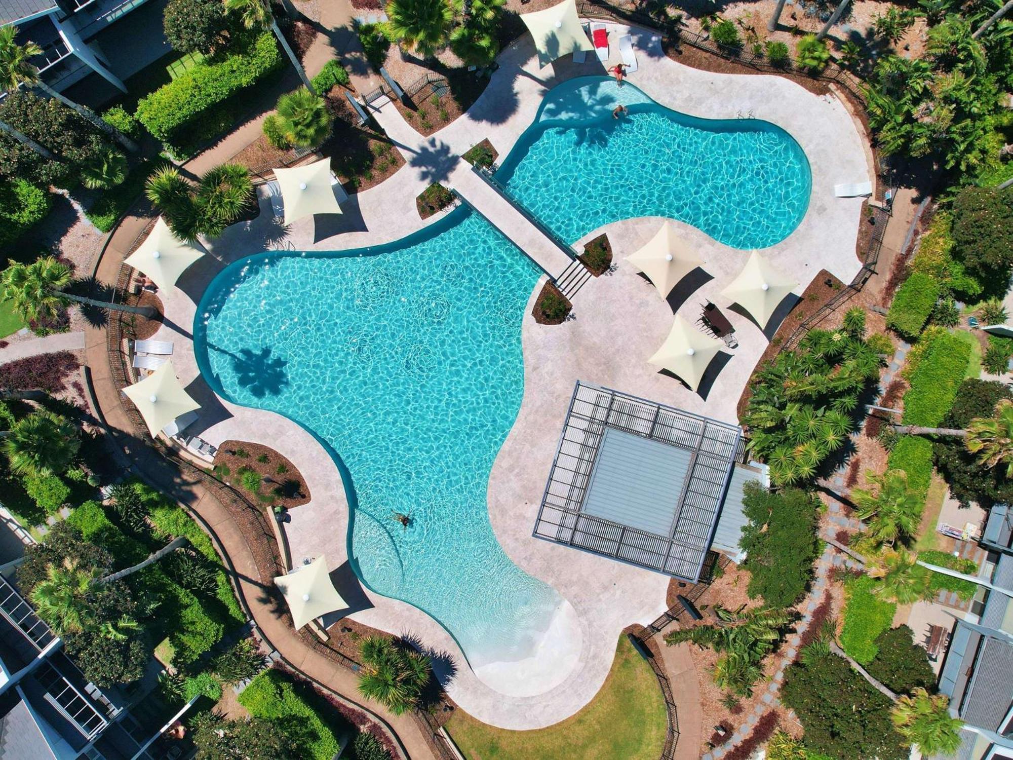 Pullman Magenta Shores Resort Entrance Zewnętrze zdjęcie Aerial view of the pool